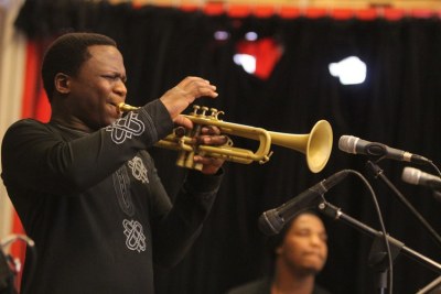 Nigerian Trumpeter Joseph Kunnuji doing a gig at the Guga S’thebe Community Centre.