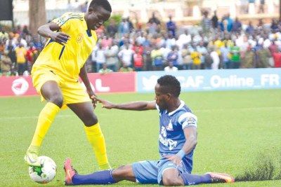 KCCA youngster Julius Poloto (L) earned a starting place against Rivers United yesterday but victory eluded his side.