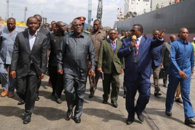 President John Magufuli of Tanzania (front 2nd left) inspects the Dar es Salaam Port early this year. The improvements at the port are expected to quicken delivery of services.