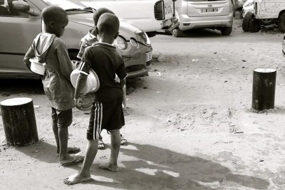 Talibés begging in downtown Dakar, Senegal.