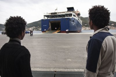 Two young Eritreans wait to board a ferry at Samos Island, Greece. Growing numbers of Eritreans are seeking asylum in Europe.