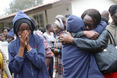 Parents and students of Moi Girls School Nairobi overcome by grief after a fire that claimed the lives of nine students.