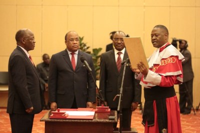 President John Magufuli swears-in Professor Ibrahim Hamisi Juma as the country's eighth Chief Justice of post-independence Tanzania at a ceremony at the State House in Dar es Salaam.