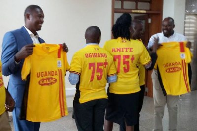 Ruling party MPs dressed in T-shirts showing support for the lifting of the age limit.