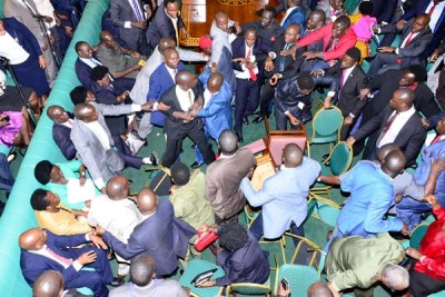 MPs fight in Parliament after trading accusations of smuggling a gun in the House during plenary on September 26, 2017.