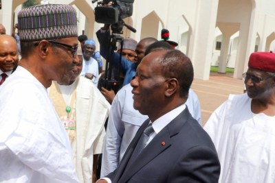Nigerian President Muhammadu Buhari and President Alassane Ouattara of Cote d'Ivoire
