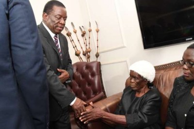 President Emmerson Mnangagwa consoles Morgan Tsvangirai’s mother Mbuya Lydia Chibwe Tsvangirai and other mourners at the MDC-T leader’s residence in Highlands, Harare on Sunday February 18.