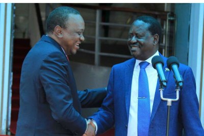 President Uhuru Kenyatta and opposition leader Raila Odinga conclude a joint press conference about the country's growth, at Harambee House in Nairobi on March 9, 2018.