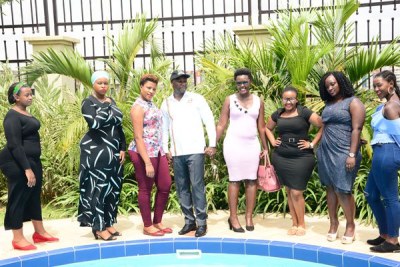 State Minister for Tourism Mr Godfrey Kiwanda with Ugandan models at the launch of ‘Miss Curvy Uganda’ at a Kampala hotel on February 5, 2019.
