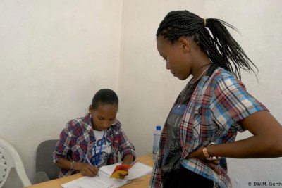 First-time voter Mehret Beyeyne registers for a referendum which is to determine if her ethnic group, the Sidamas, will have their own semi-autonomous state in Ethiopia.