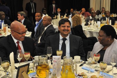 Former president Jacob Zuma, left, Atul Gupta, centre, and former Eastern Cape premier Noxolo Kieviet at a function in 2012.