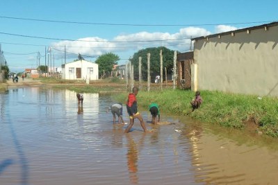Children play in water which flooded Shukushuma in Nelson Mandela Bay over the weekend.