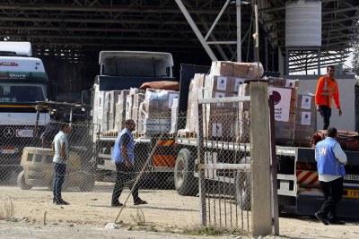 Aid convoys enter the Gaza Strip through the Rafah crossing border in Egypt.