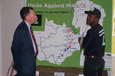Kent Campbell and Kafula Silumbe at a World Malaria Day exhibition at the Lusaka National Museum in 2005.